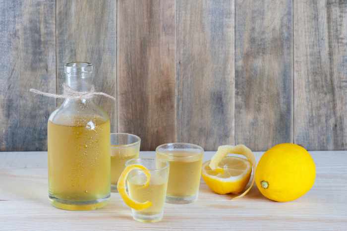 Homemade,Limonchello,On,The,Wooden,Background
